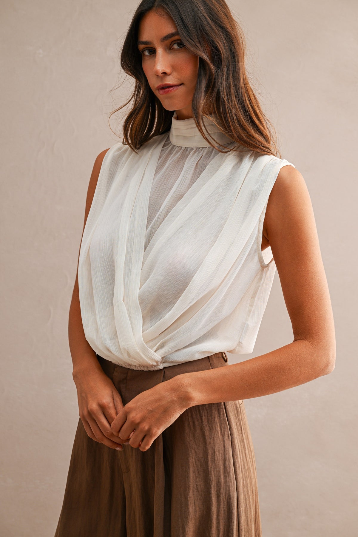 Chiffon Sleeveless Draped Top In Cream