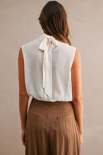 Chiffon Sleeveless Draped Top In Cream