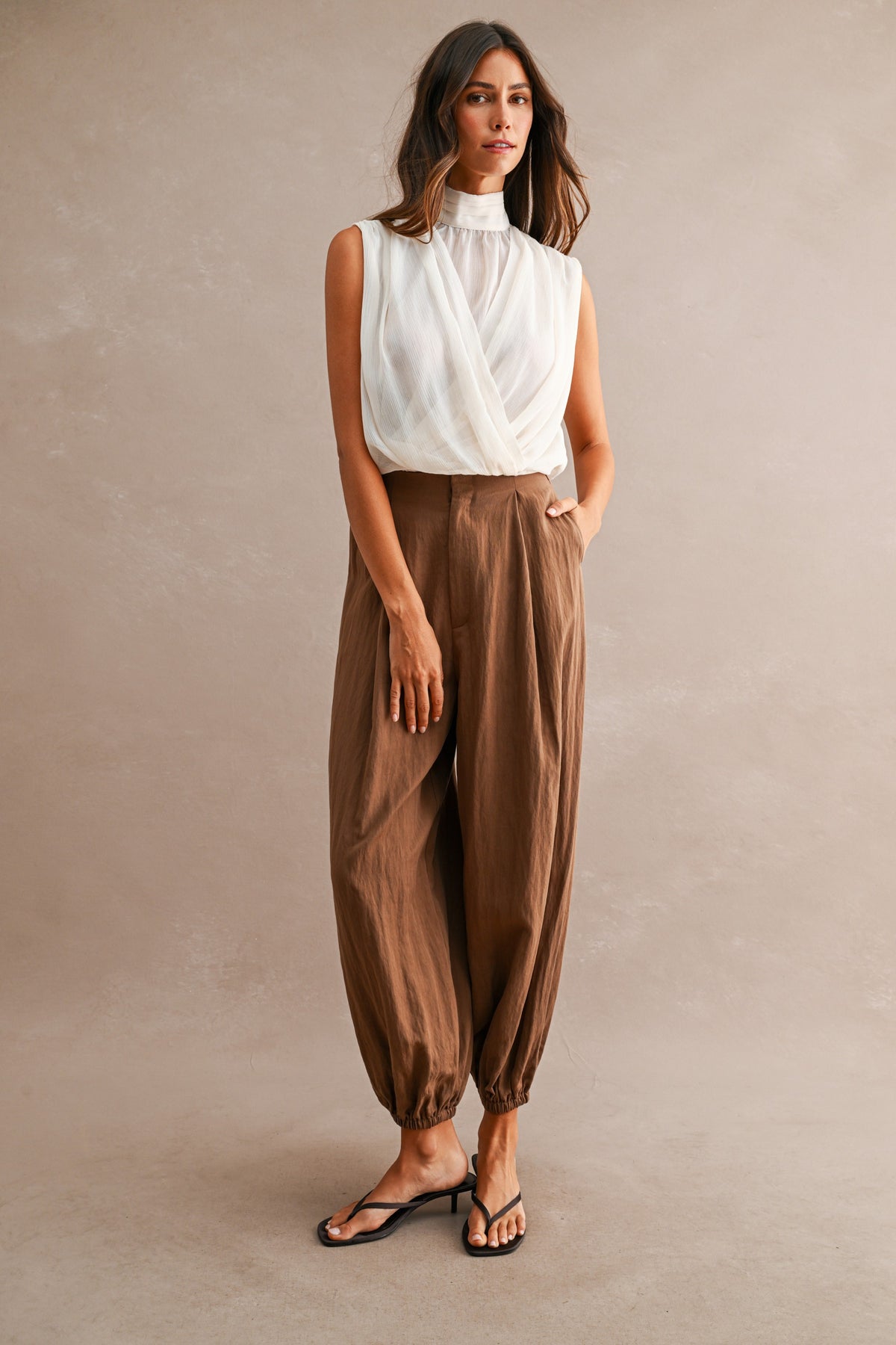 Chiffon Sleeveless Draped Top In Cream